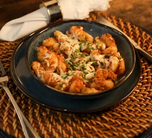 Ñoquis con salsa boloñesa