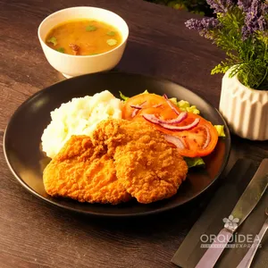 Milanesa pollo apanada