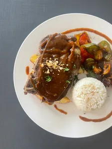Chuleta de Cerdo en salsa Bechamel