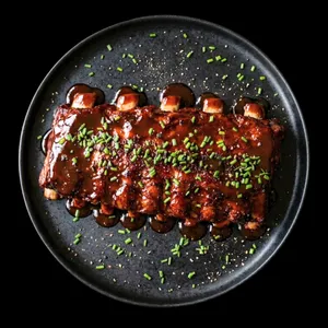 Korean BBQ baby back ribs - Slow cook PORCION INDIVIDUAL 370 gr +-