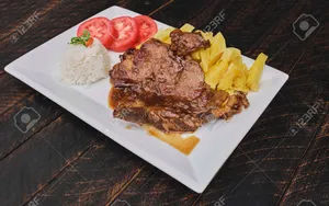 Bistec con papas fritas