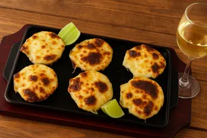 Ostiones a la parmesana (6 unidades)