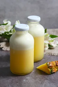 Botella jugo piña 250 ml.
