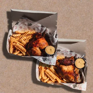 Medio pollo a la brasa con guarnición