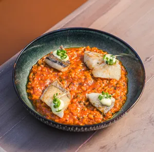 Arroz cremoso con Pesca del día