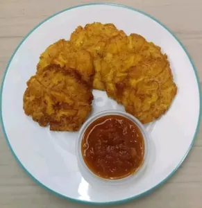 Ración de patacón con hogao