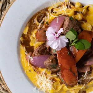 Fetuccini Huancaina Con Lomo Saltado