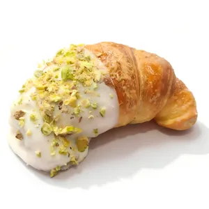 Medialuna punta de chocolate blanco y pistacho molido