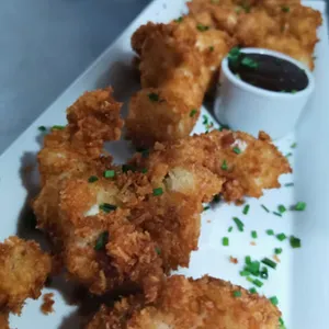 Nugget de pollo + Salsa  BBQ 10 Unidades