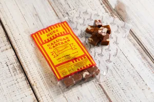 Caluga de leche-nuez 100gr.