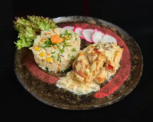 Medallón De Pollo En Crema De Champiñón