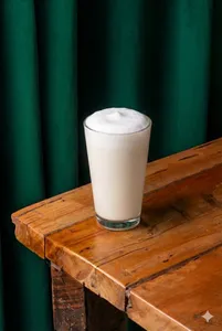 Leche tibia con Esencia