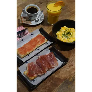 Café  o Té + Zumo de Naranja + Tostada