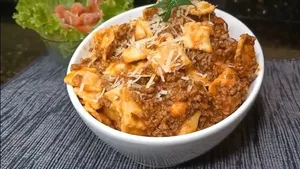 Ravioles de Carne en Salsa Boloñesa