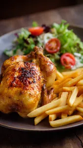 MEDIO POLLO +PAPITAS Y ENSALADA
