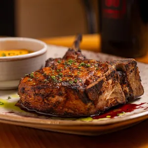TOMAHAWK DE CERDO
