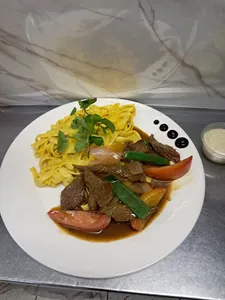Fetuccini Huancaina Lomo