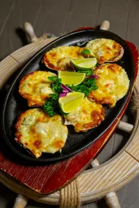 Ostiones a la Parmesana 6 unidades al horno