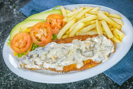 Pescado En Salsa De Champiñones