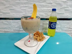 Leche de tigre con pota + bebida