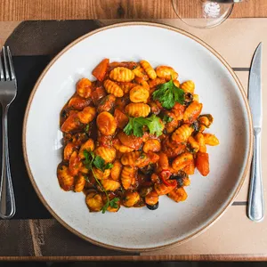 Gnocchi con ragu di pesce