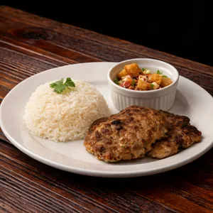 Fricandela con arroz y mini ensalada