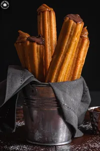 2 churros rellenos de manjar