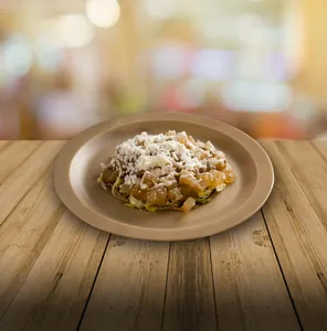 Tostada (incluye una porción de salsa)