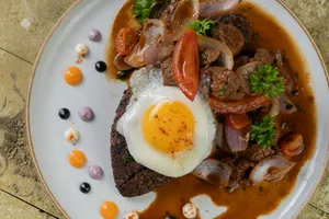 Tacu Tacu de Lomo Saltado