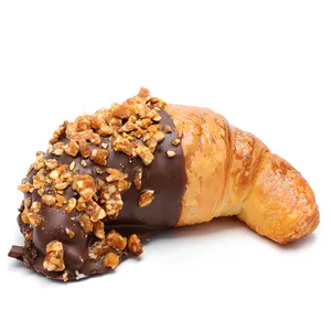 Medialuna con punta bañada en delicioso chocolate alfajor y cubierta por maní crocante