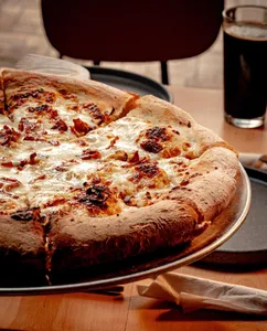 PIZZA DE PORO Y TOCINO
