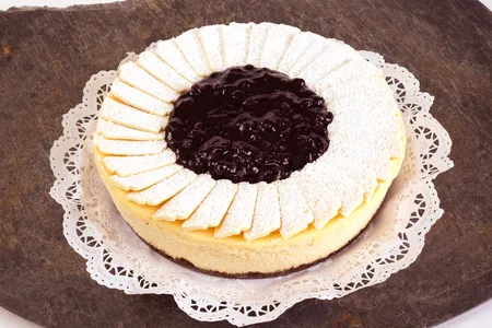 Cheese cake chocolate blanco arándanos ( 5p aprox )