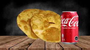 2 Sopaipillas Con 1 Lata De Coca-Cola
