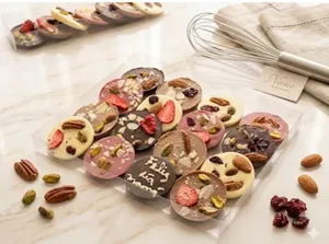 Monedas de chocolate con frutos secos