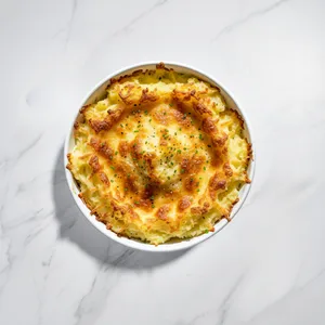 Puré de papa gratinado