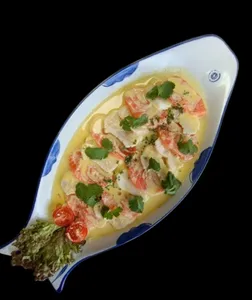 Tiradito mixto (loco y salmon.)