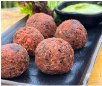 Veggie balls con salsa acevichada