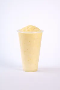 Jugo mango en leche