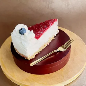 Porción de Cheesecake de frutos rojos
