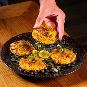 MARISCOS A LA PARMESANA