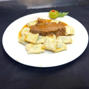 Asado de Tira con Ravioles