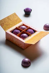 Caja de bombones y trufas del mes morado (4 unidades)