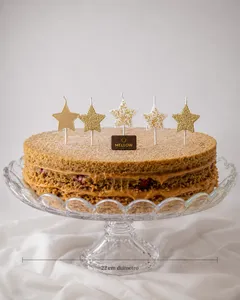 Vela estrella dorada