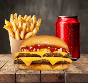 Hamburguesa doble carne + papas fritas individuales + bebida en lata 350 ml