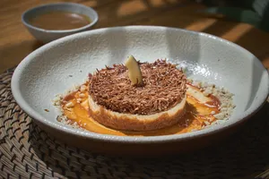 Cheesecake de coco (contiene maní)