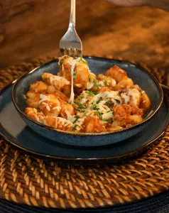 Ñoquis con salsa boloñesa