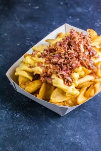 Papas Rústicas con Cheddar & Bacon