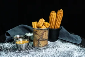 8 Churros Bites + 2 Rellenos DL + 1 Salsa