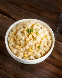 Porcion arroz blanco cocido con choclo