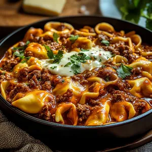Tortellini de Queso en Salsa Boloñesa